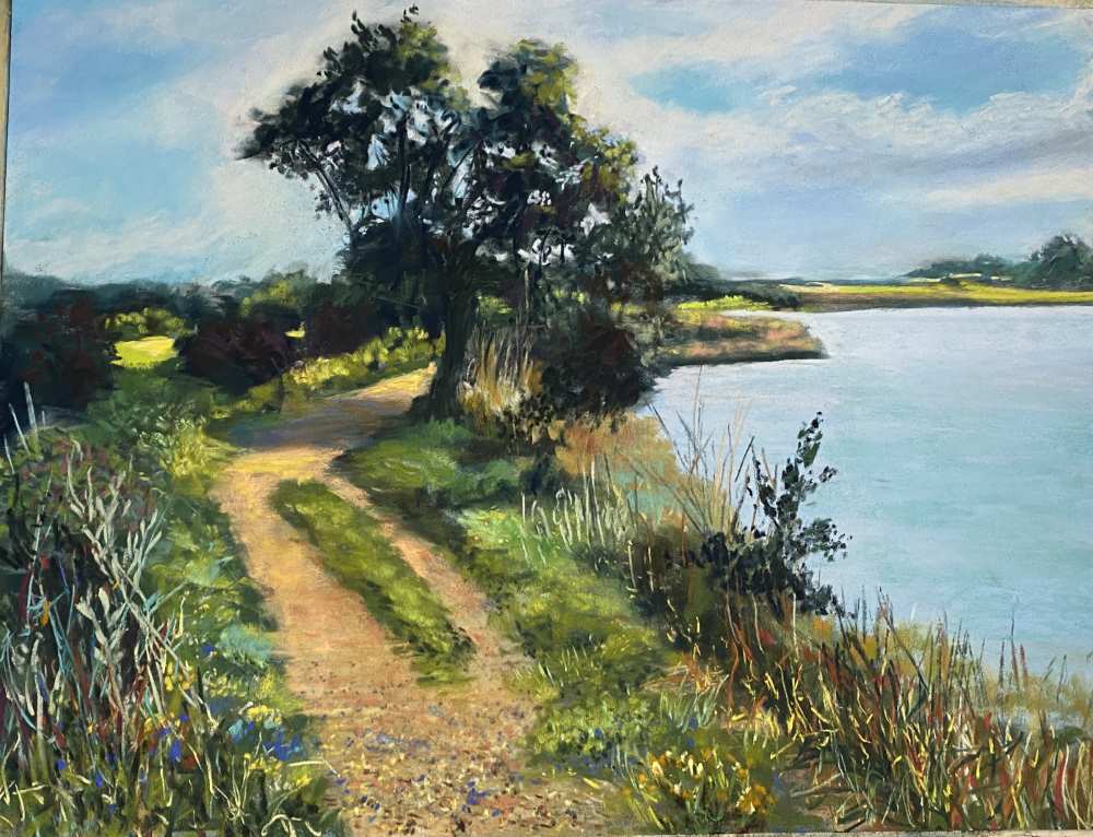 A different version of the Soft Pastel painting of a river with a trail running along the grassy banks.