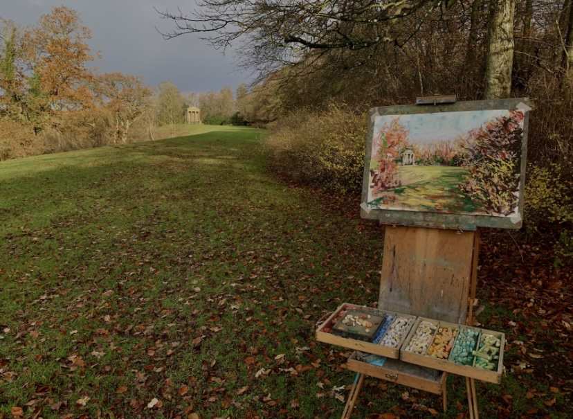 Andrew's set up, with painting on an easel.