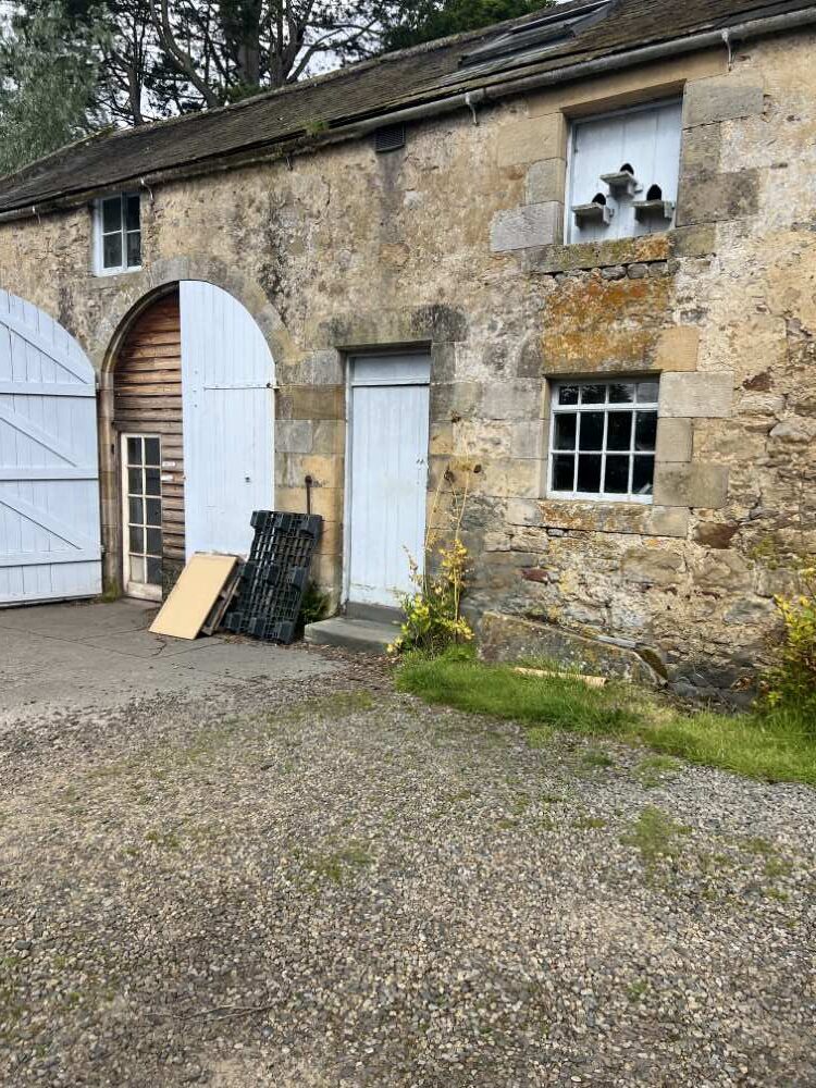 Outside the coach house.